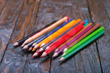 color pencils on a table, school supplies