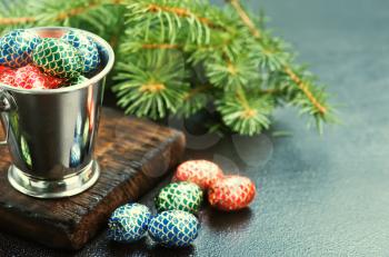 christmas candy on a table, chocolate candy and christmas decoration