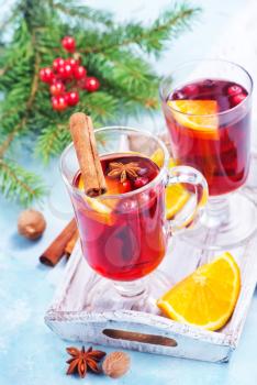 christmas drink with fruits and aroma spice