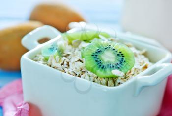 oat flakes with kiwi in the bowl