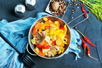 fried vegetables in bowl and on a table