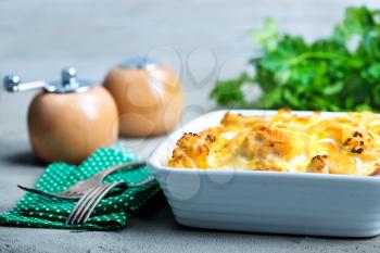 gratin with cauliflower and cheese on a table