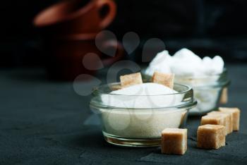 sugar in bowl and on a table