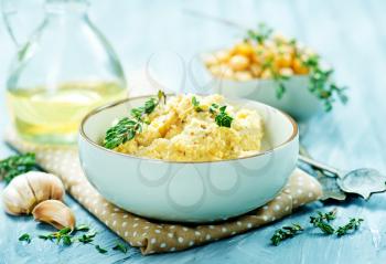 humus in bowl and on a table