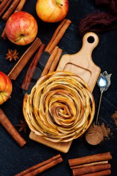 pie with apple and cinnamon on a table