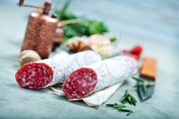 salami with aroma spice on a table