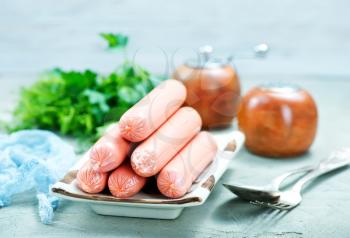 sausages on the black table, stock photo