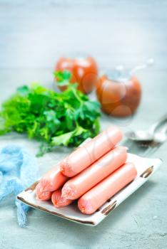 sausages on the black table, stock photo