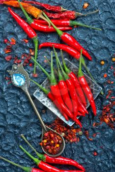 chilli peppers on a table, stock photo