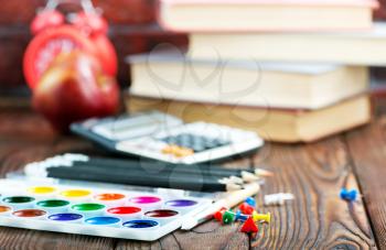 color paint and brushes on a table