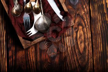 vintage kitchen supplies in wooden box and on a table