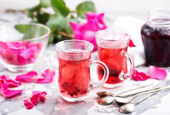 tea with rose on a table, stock photo