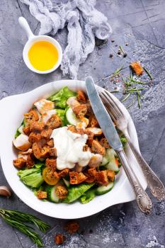 caesar salad, salad with grilled chicken on plate