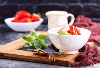 oat porridge in bowl and on a table