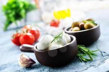 ingredients for caprese salad on a table