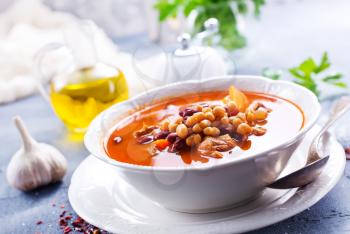 soup with bean and meat in the bowl