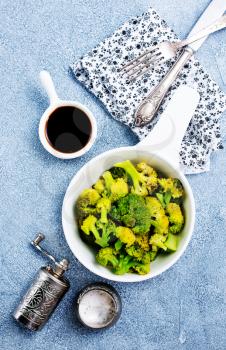 boiled broccoli in bowl, diet food, stock photo