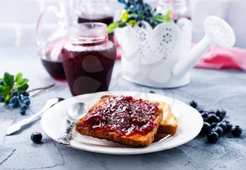 toasts and blueberry jam for the breakfast