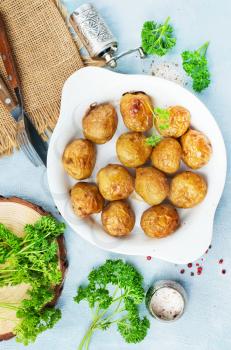 Tasty boiled potatoes, potato with butter dill parsley