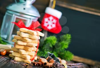 christmas cookies and christmas decoration on a table