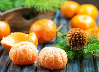 fresh mandarins on a table, christmas background