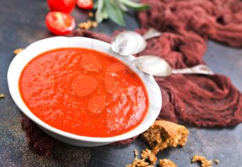 Tasty tomato soup with aroma spice and herbs