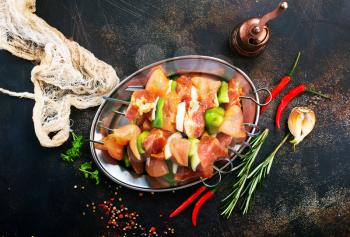 raw chicken kebab with fresh vegetables, diet food