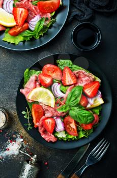 Fresh salad with  hamon, blue cheese and strawberry 