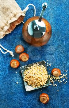 huzelnuts on plate and on a table