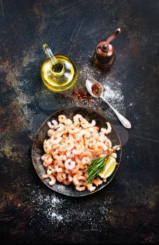 boiled shrimps with pepper and salt on plate