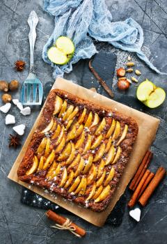 apple pie with cinnamon on a table