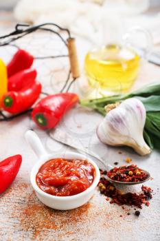 sauce with pepper in bowl, stock photo