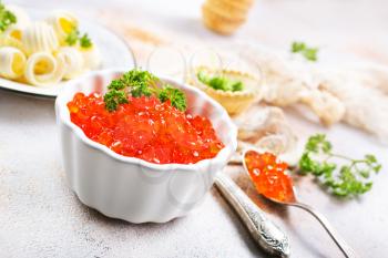 butter with bread and red salmon caviar