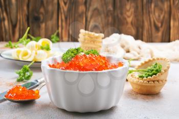 butter with bread and red salmon caviar