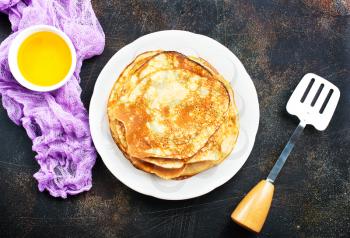 crepes with honey and fresh tea,stock photo