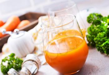 A glass of fresh carrot smoothie, carrot juice