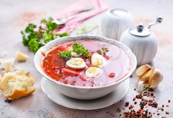 Traditional Ukrainian borsch, red beet soup with boiled eggs