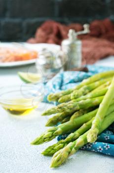 green asparagus on kitchen table, fresh asparagus