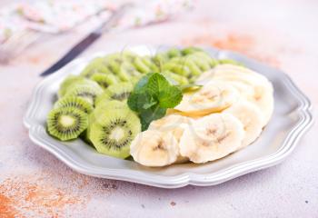 kiwi and banana on plate, fresh fruits