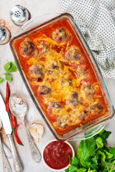 meat balls with tomato sauce and cheese