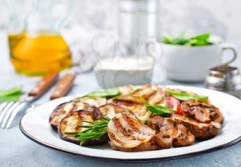 grilled vegetables with sauce on the plate, stock photo