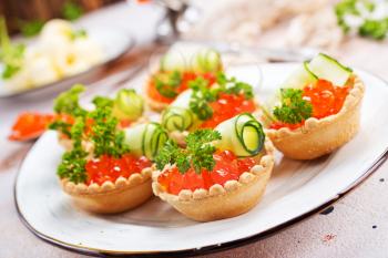 salmon caviar with butter, caviar and tartalets, stock photo