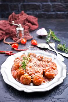 meatballs with cheese and sauce, meatballs on plate