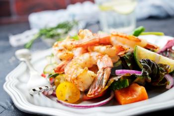 salad with fried shrimps on plate, fresh salad