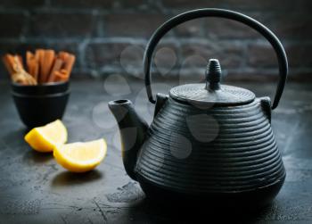 fresh tea with mint in teapot, tea with lemon