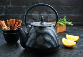 fresh tea with mint in teapot, tea with lemon