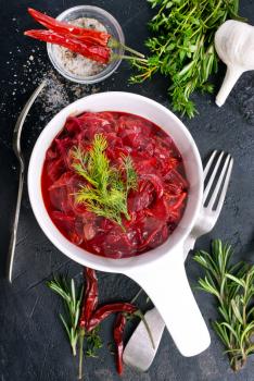 fried beet with garlick in bowl, beet salad
