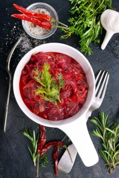 fried beet with garlick in bowl, beet salad