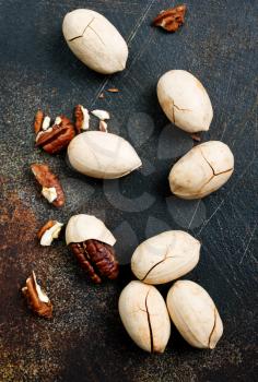 Pecan nuts on a table, pecan nuts in shell