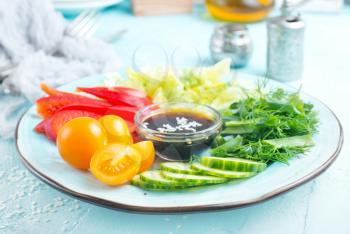 vegetables for salad, fresh vegetables and sauce